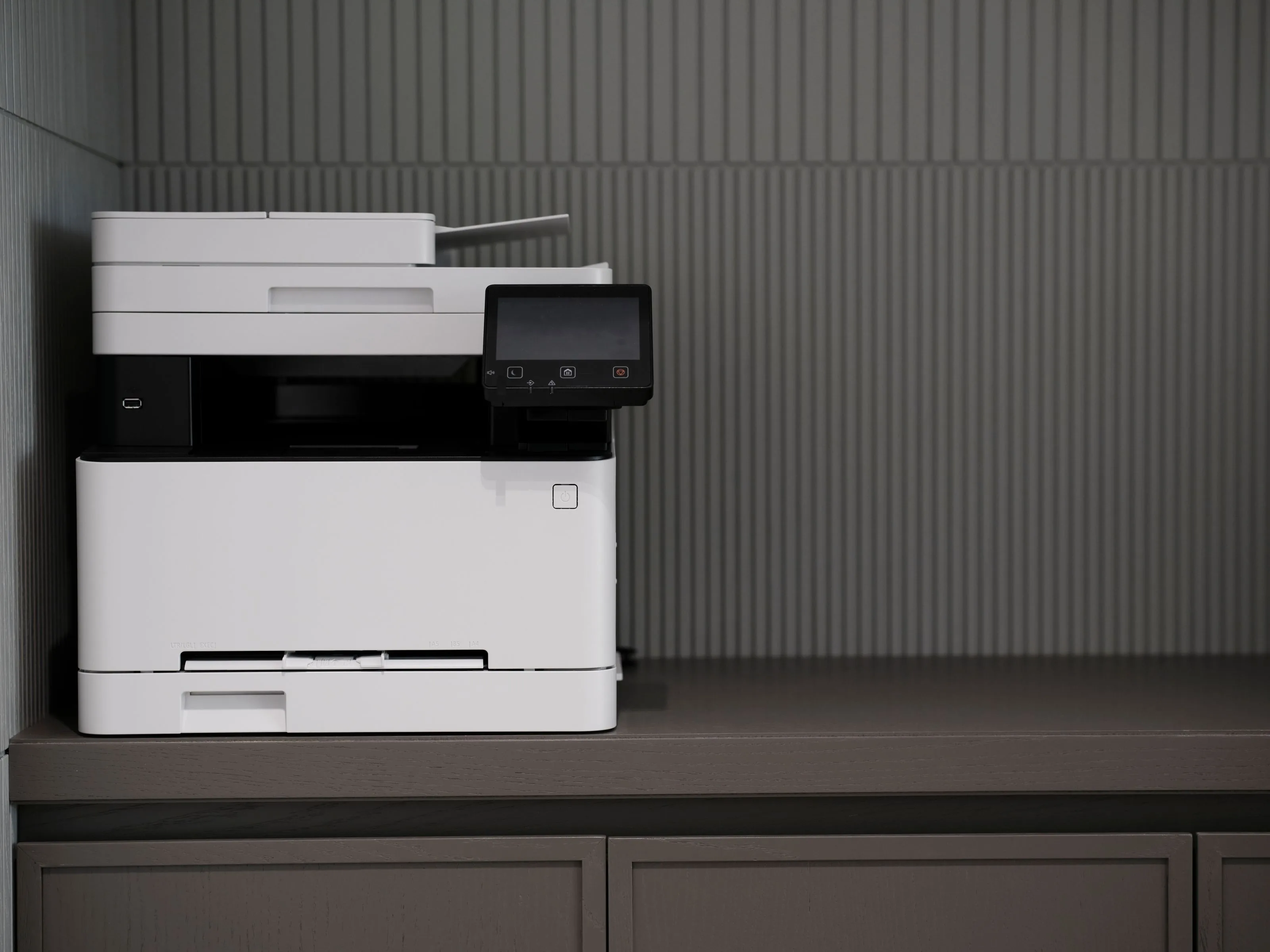 Modern multifunction office printer with a touchscreen control panel